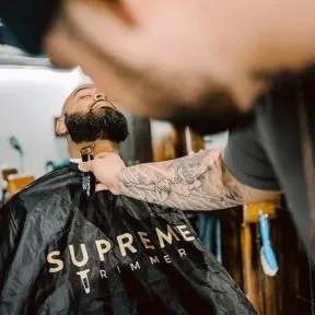 Supreme Trimmer Barber Cape - Gold Logo